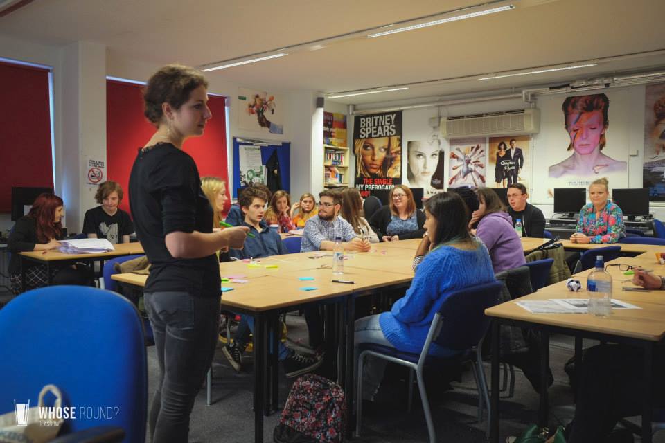 Class of students listening to a workshop facilitator